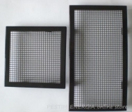 Fireplace grille glosy black colour with a wide frame